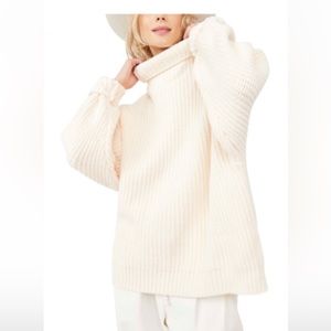 FREE PEOPLE Swim Too Deep turtleneck sweater. color: powder puff. size XS.